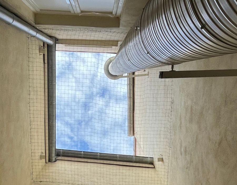 filets anti pigeons sur cheminee industrielle aubervillers pose bathygiene